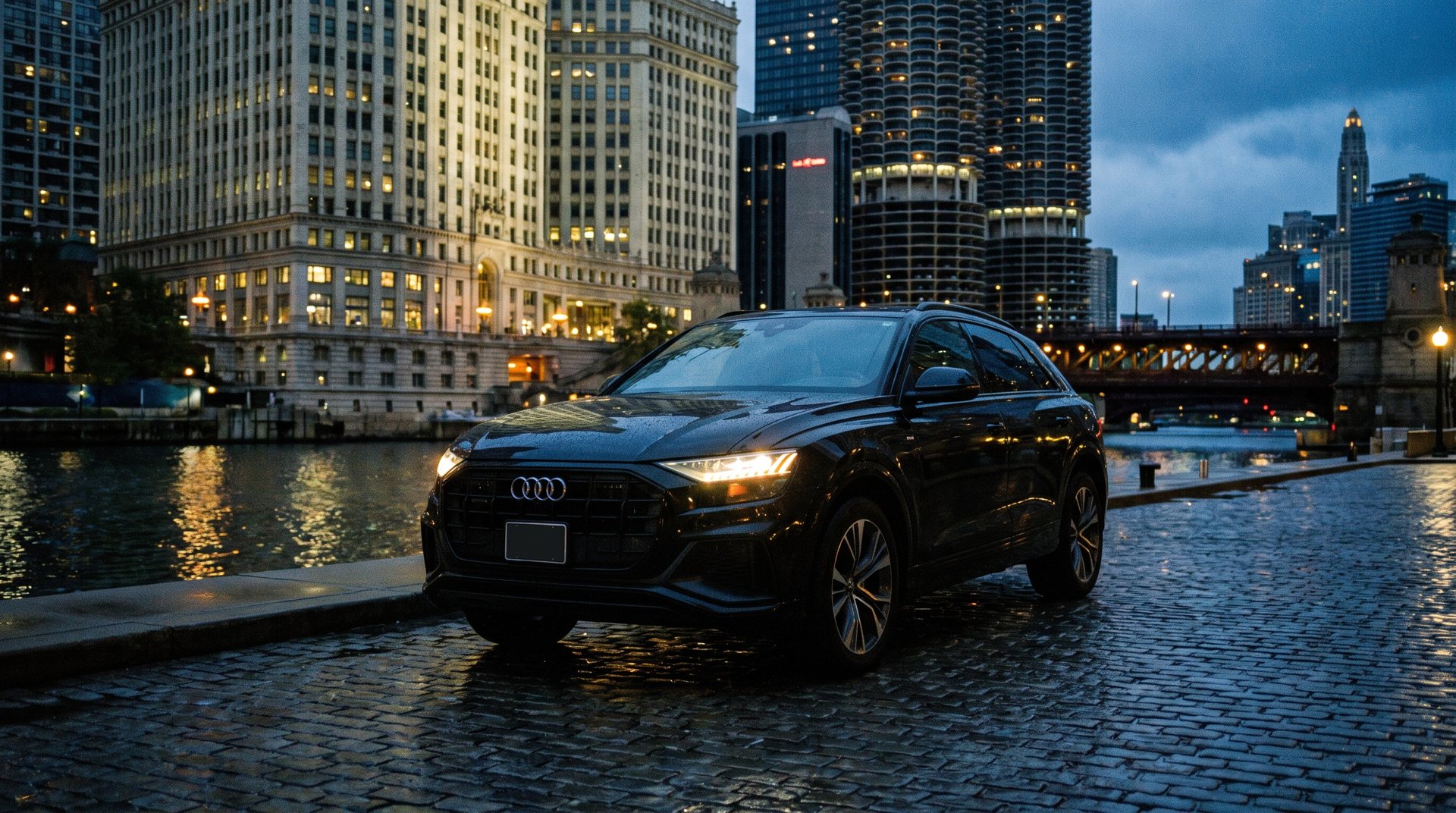 SUV on a riverwalk with towers behind